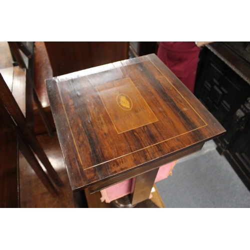 207 - A 19th century rosewood work table.