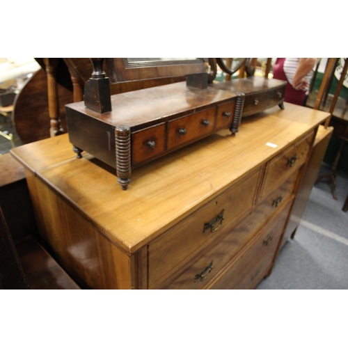 219 - A Victorian satin walnut chest of drawers.