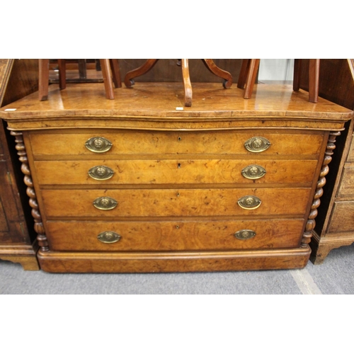 229 - A good continental burr walnut four drawer chest with barley twist columns to each end.