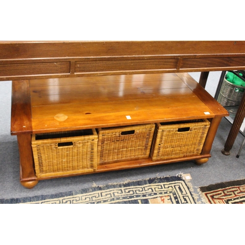 239 - A modern coffee table fitted with three wicker baskets.