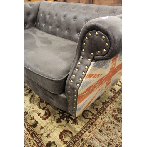 248 - A modern Chesterfield style settee.