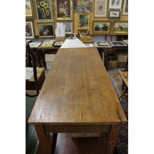 274 - An oak three drawer side table.