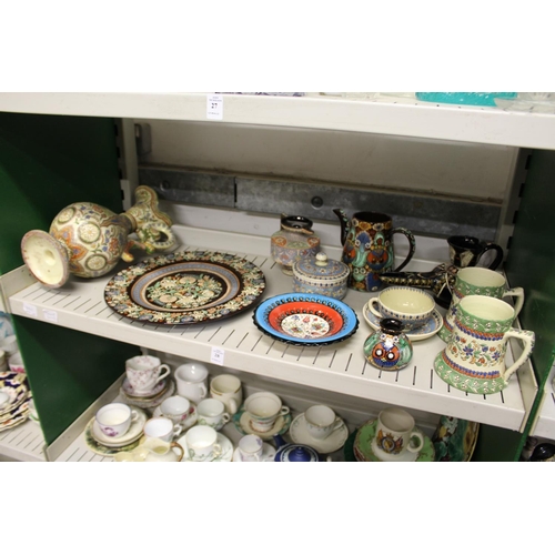 28 - A quantity of Swiss Thoune decorative pottery items to include a ewer, various mugs, plates etc.