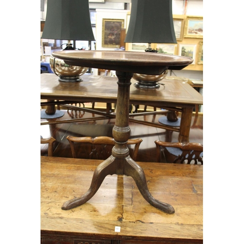 283 - A mahogany circular tilt top tripod table.