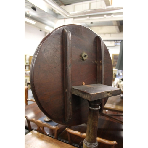 283 - A mahogany circular tilt top tripod table.