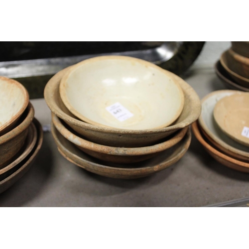 643 - Four Chinese pottery bowls.