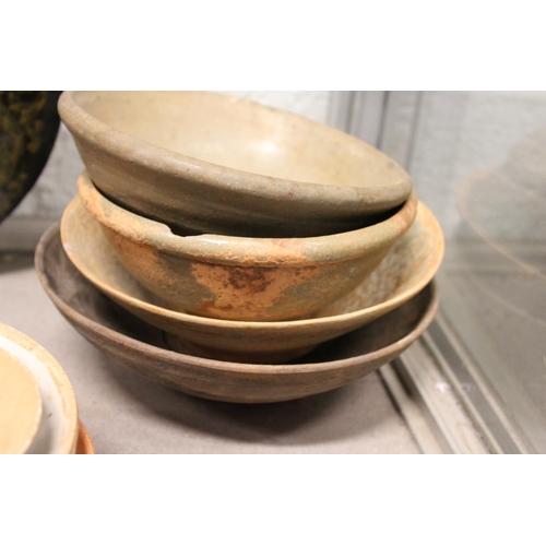 645 - Four Chinese pottery bowls.