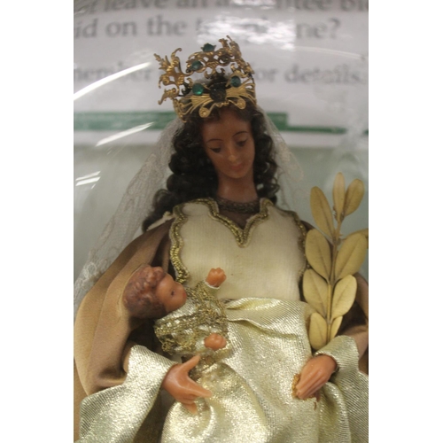 648 - A wax model of the Madonna and Child under a glass dome.