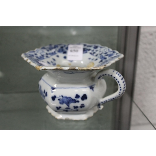 650 - A 19th century blue and white decorated porcelain personal spitoon.