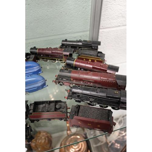 651 - A collection of Hornby double OO gauge trains and carriages.