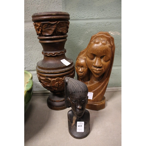 653 - A carved wood bust and a similar vase.