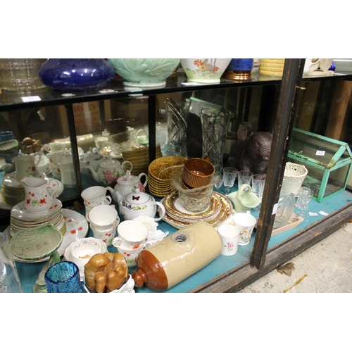 69 - A large shelf of decorative china, glass etc.