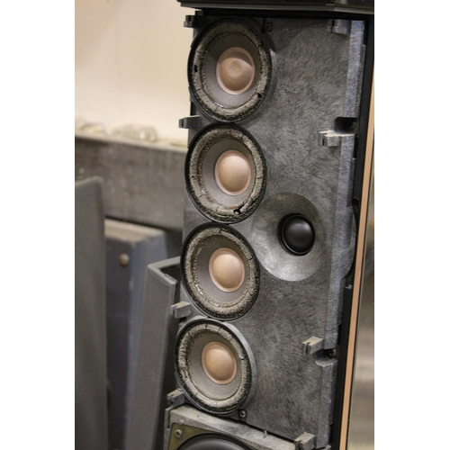 8 - A pair of Bang & Olufsen tall column shaped speakers.