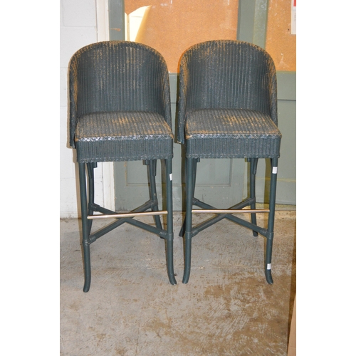 140A - A pair of modern Lloyd Loom bar stools.