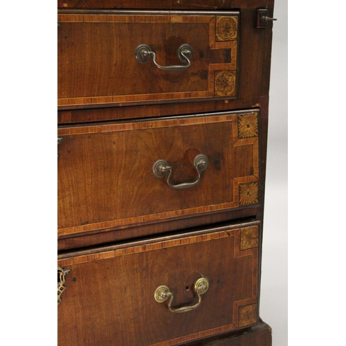 1002 - A GEORGE III MAHOGANY AND INLAID BUREAU, with a fall flap over three drawers, on bracket feet. 2ft 9... 