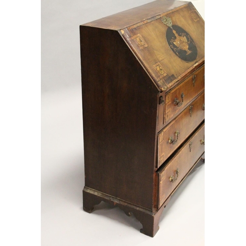 1002 - A GEORGE III MAHOGANY AND INLAID BUREAU, with a fall flap over three drawers, on bracket feet. 2ft 9... 