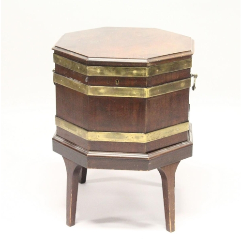 1010 - A GEORGE III MAHOGANY AND BRASS BOUND OCTAGONAL CELLARETTE , on tapering square legs. 1ft 8ins wide ... 