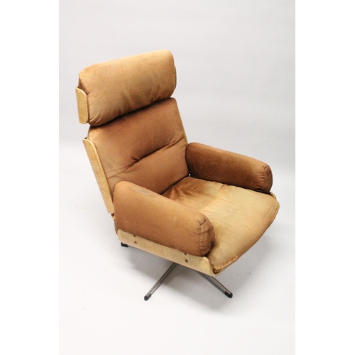 1019 - IN THE MANNER OF CHARLES EAMES, an office armchair, with brown draylon upholstered headrest, back an... 