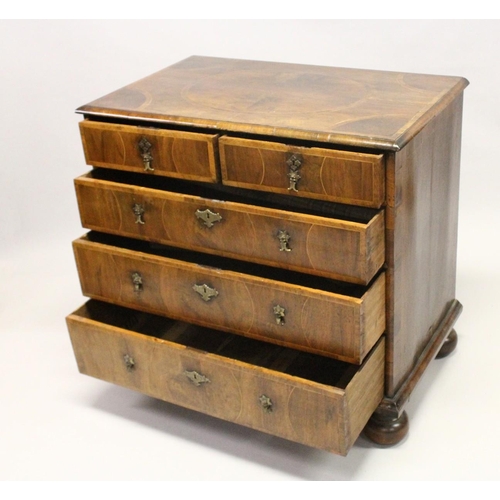 1022 - AN 18TH CENTURY WALNUT CHEST OF DRAWERS, with decoratively veneered top and drawers, boxwood stringi... 