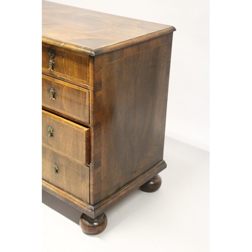 1022 - AN 18TH CENTURY WALNUT CHEST OF DRAWERS, with decoratively veneered top and drawers, boxwood stringi... 