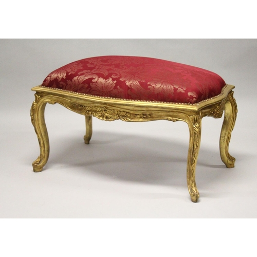 1028 - A GOOD GILT RED PADDED TOP WINDOW SEAT. 40ins long.