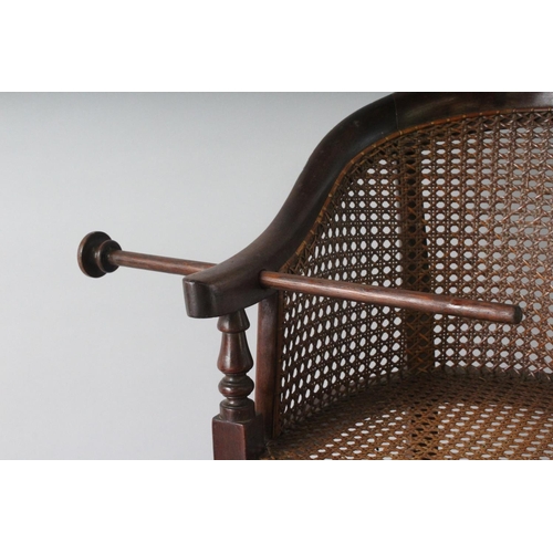 1034 - A 19TH CENTURY BERGERE STYLE HIGH CHAIR ON STAND. 2ft 8ins high.