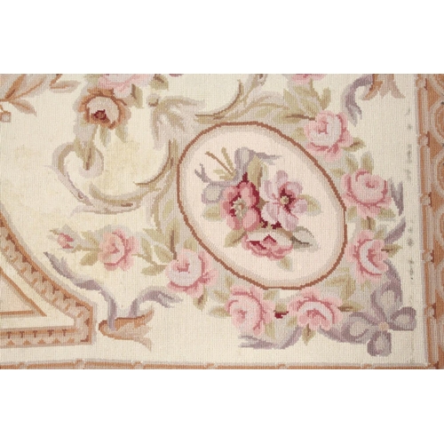 1049 - AN AUBUSSON STYLE TAPESTRY WALL HANGING, beige ground decorated with floral panels. 9ft 0ins x 6ft 0... 