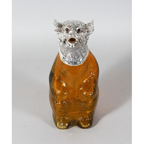 1051 - A GOOD AMBER GLASS BEAR CLARET JUG with plated head and collar. 9ins high.