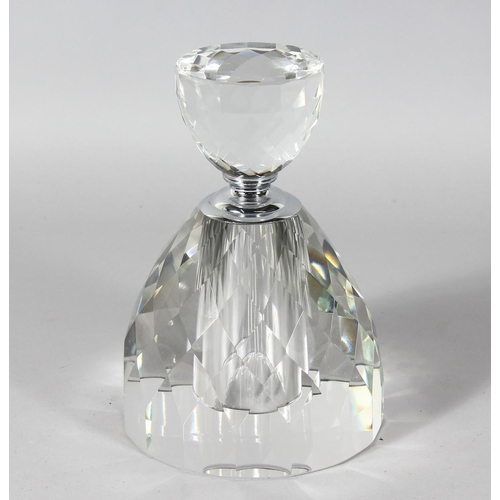 1054 - A HEAVY FACET CUT CIRCULAR SCENT BOTTLE AND STOPPER. 9ins high.