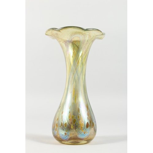 1061 - A TIFFANY FAVRILE STYLE GLASS FRILLY EDGE VASE. 8.5ins high.