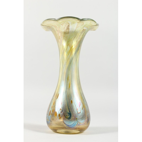 1061 - A TIFFANY FAVRILE STYLE GLASS FRILLY EDGE VASE. 8.5ins high.