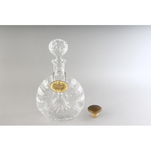 1074 - A BACCARAT CRYSTAL REMY MARTIN DECANTER AND STOPPER in a velvet box.