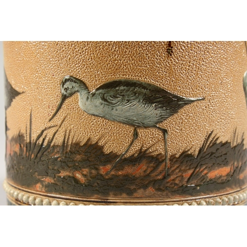 1080 - A GOOD DOULTON LAMBETH STONEWARE BISCUIT BARREL by FLORENCE E. BARLOW painted with birds. Maker F.E.... 