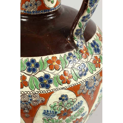 1093 - A LARGE TURKISH POTTERY TWO-HANDLED VASE AND COVER. 24ins high.