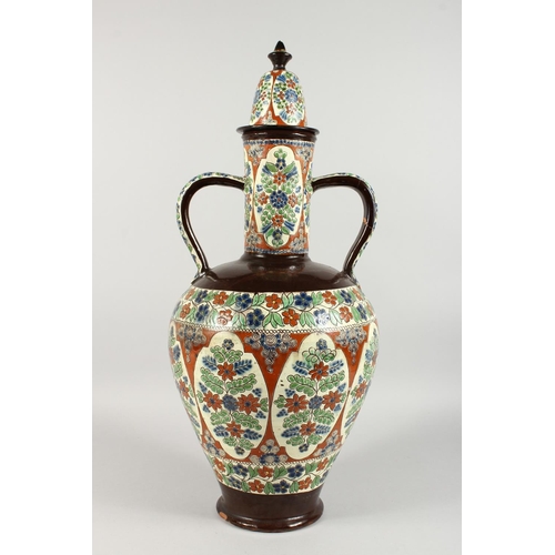 1093 - A LARGE TURKISH POTTERY TWO-HANDLED VASE AND COVER. 24ins high.