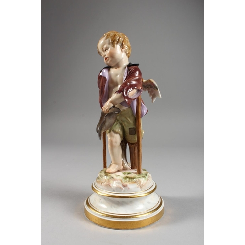 1118 - A MEISSEN PORCELAIN FIGURE OF A CHERUB holding a hat and walking with a stick. Cross swords mark in ... 