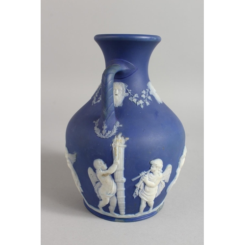 1125 - A BLUE JASPER WARE TWO HANDLED PORTLAND VASE. 7.5ins high.