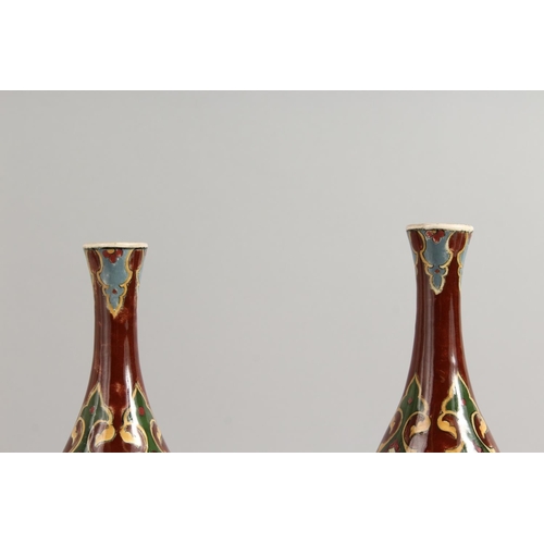 1127 - A GOOD PAIR OF ROYAL BONN OLD DUTCH VASES. 11ins high.