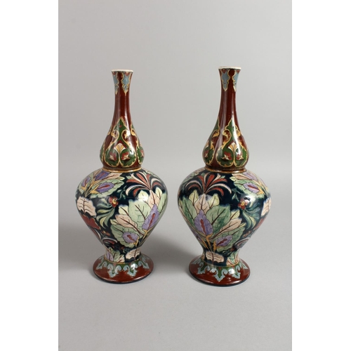 1127 - A GOOD PAIR OF ROYAL BONN OLD DUTCH VASES. 11ins high.