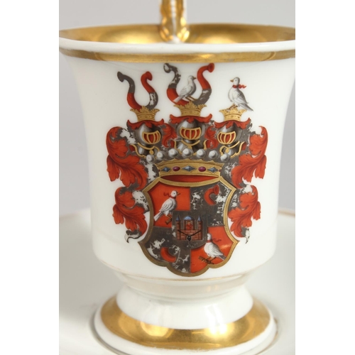 1130 - A BERLIN ARMORIAL CUP AND SAUCER.