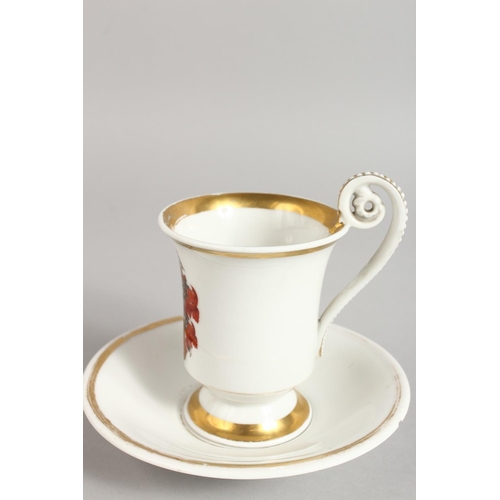 1130 - A BERLIN ARMORIAL CUP AND SAUCER.