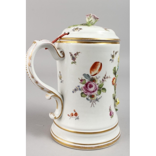 1136 - A GOOD AUGUSTUS REX DRESDEN TANKARD AND COVER, with rose knop painted and encrusted with flowers wit... 