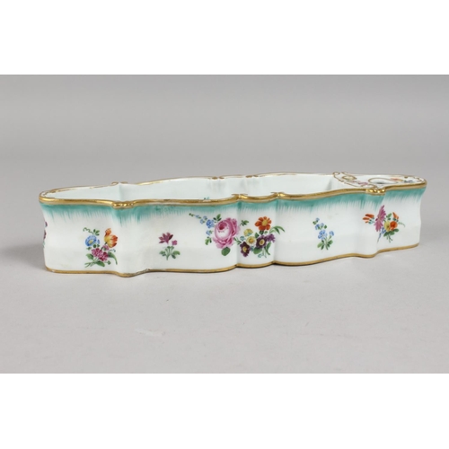 1139 - A RARE MEISSEN LONG INKWELL painted with flowers. Cross swords mark in blue.  10.75ins long.