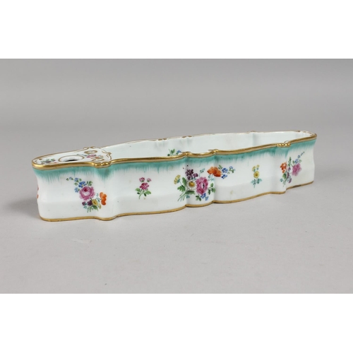 1139 - A RARE MEISSEN LONG INKWELL painted with flowers. Cross swords mark in blue.  10.75ins long.