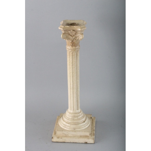 1157 - TWO CREAMWARE CORINTHIAN COLUMN CANDLESTICKS. 12ins high.