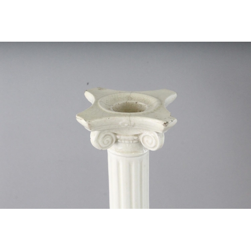 1157 - TWO CREAMWARE CORINTHIAN COLUMN CANDLESTICKS. 12ins high.