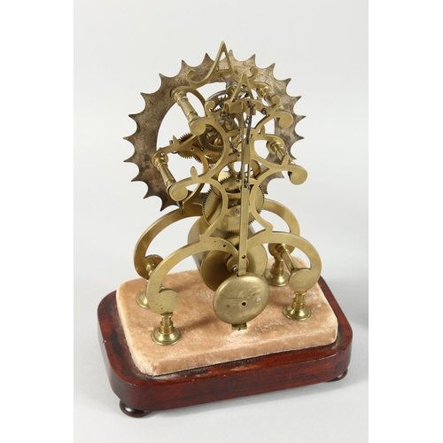 1168 - A 19TH CENTURY BRASS SKELETON CLOCK, eight-day movement, the cog shaped chapter ring with enamelled ... 