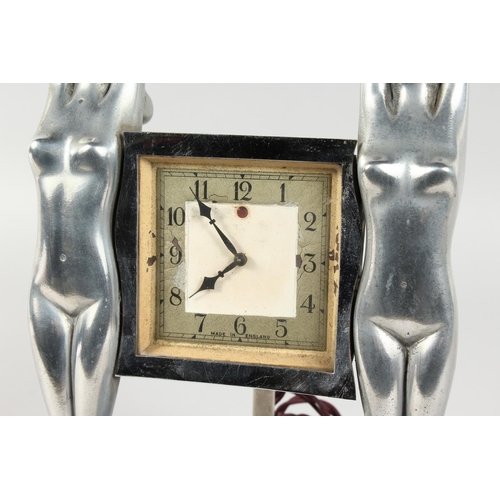 1171 - AN ART DECO CHROME PLATED ELECTRIC MANTLE CLOCK, by Genalex, with a square dial suspended between tw... 