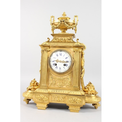 1184 - A VERY GOOD LOUIS XVI GILT ORMOLU MANTLE CLOCK, with white enamel dial, blue and white Roman numeral... 