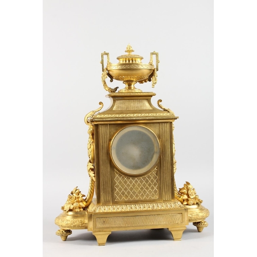 1184 - A VERY GOOD LOUIS XVI GILT ORMOLU MANTLE CLOCK, with white enamel dial, blue and white Roman numeral... 